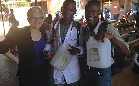 Former resident, Dr. Danielle Draper, with Malawian medical students on their family medicine rotation